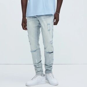 Nova Men Nicely Paint Ripped Stacked Skinny Flared Jeans Light Wash Fashion Nova
